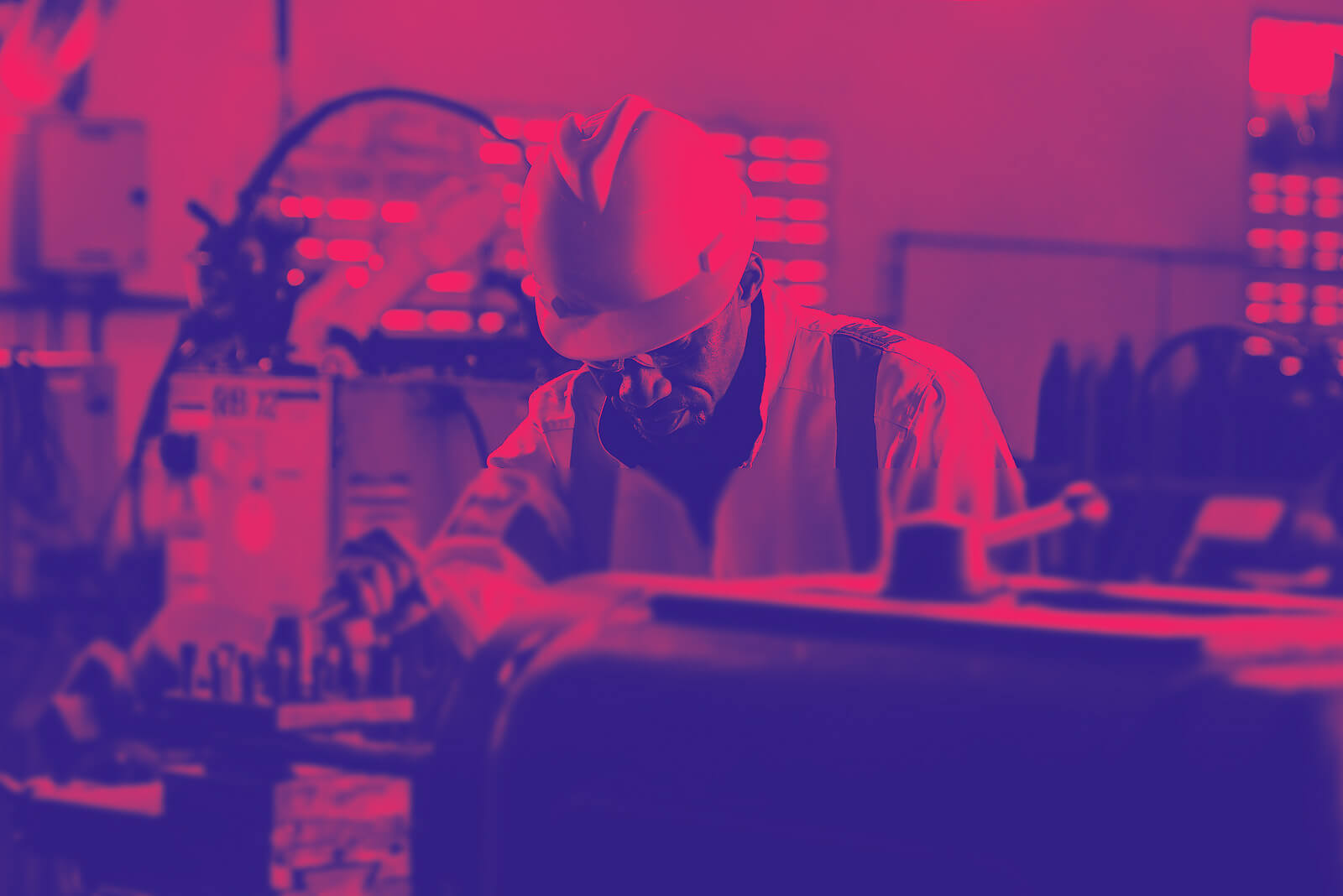 A manufacturing professional, working in a factory with IT.